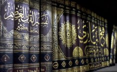 Which caliph officially ordered to compile hadith